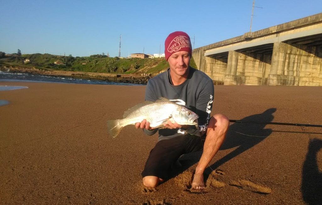 Dallas cooking over the beach from the Corner at the Umzimkulu